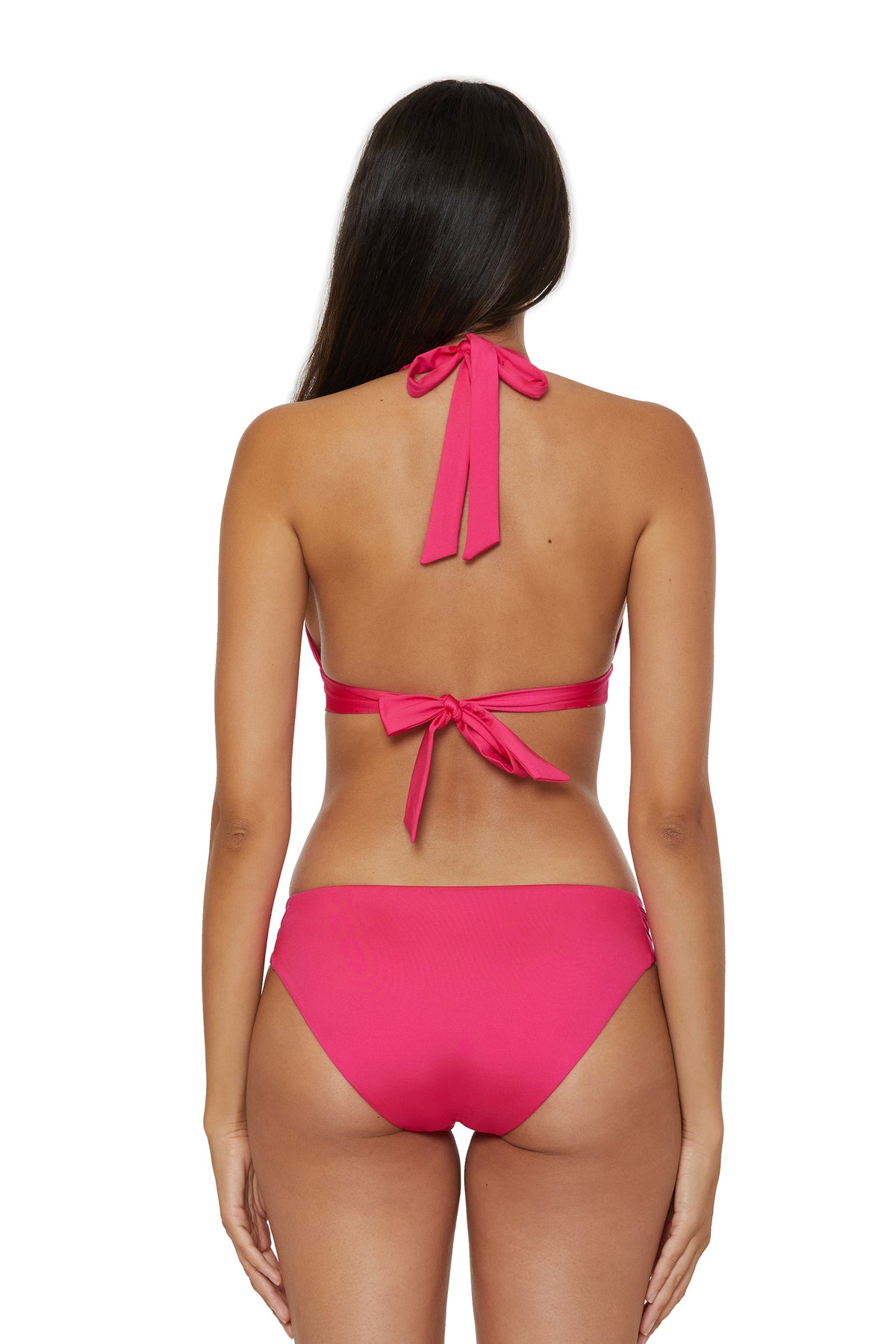 A woman with long brown hair is shown from the back wearing the Monaco Banded Halter Swim Top, a bright pink bikini with halter neck and back tie closures. Her arms are relaxed by her sides against a plain white background.