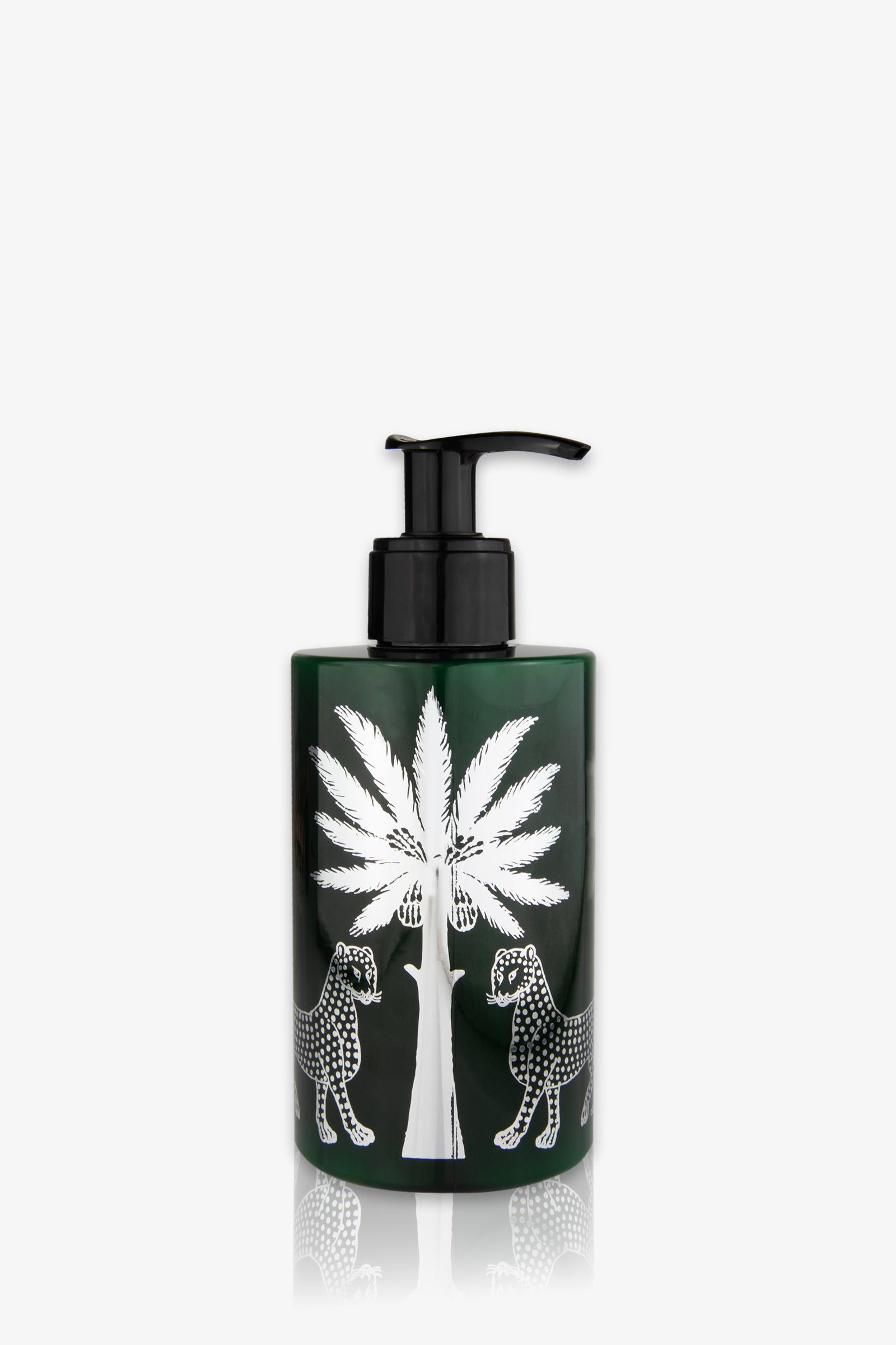 An amber pump bottle of Ortigia Ambra Nera Lotion, featuring a white illustration of a palm tree with two leopards facing each other, one on each side. The background is plain white.