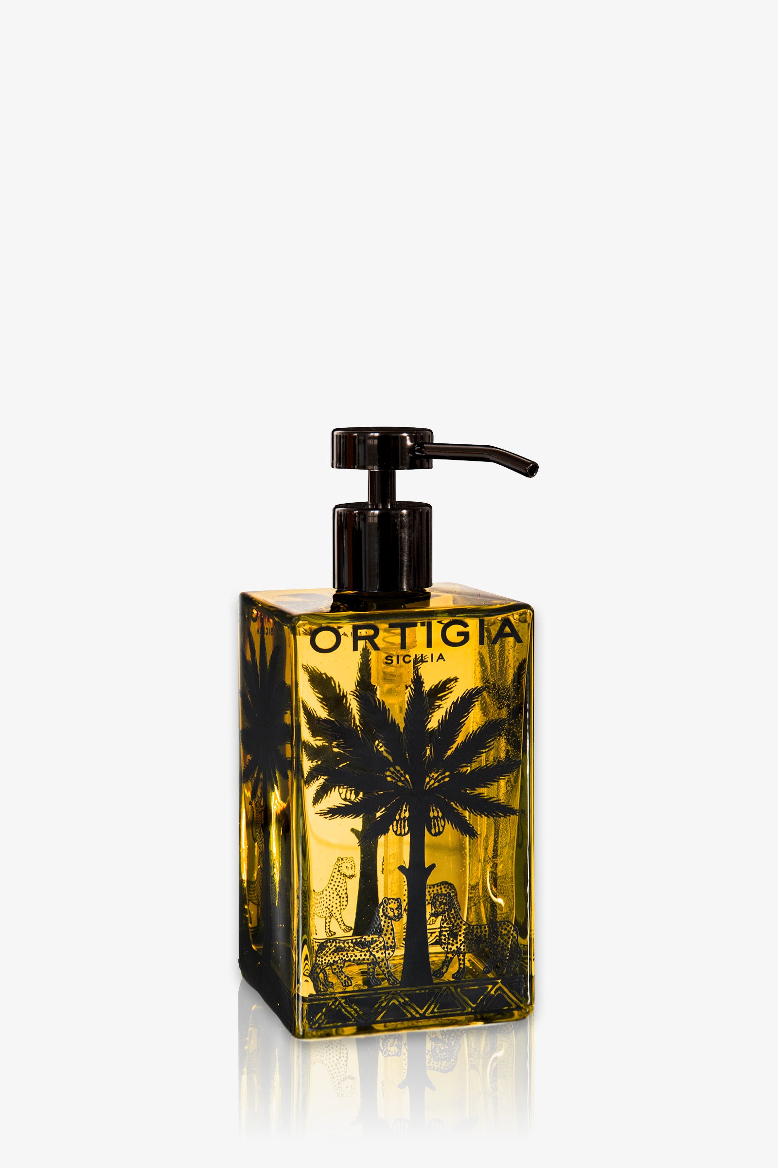 A rectangular, amber-colored Ortigia Ambra Nera Glass Soap bottle with a black pump, featuring black palm tree and leopard illustrations.