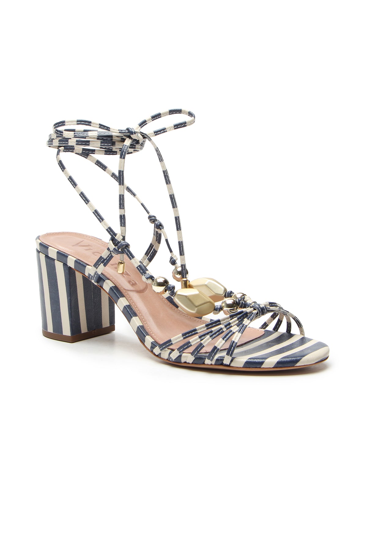The Mantua Block Heel Sandal features blue and white stripes, ankle wrap laces, a block heel, and gold charm embellishments on the front straps.