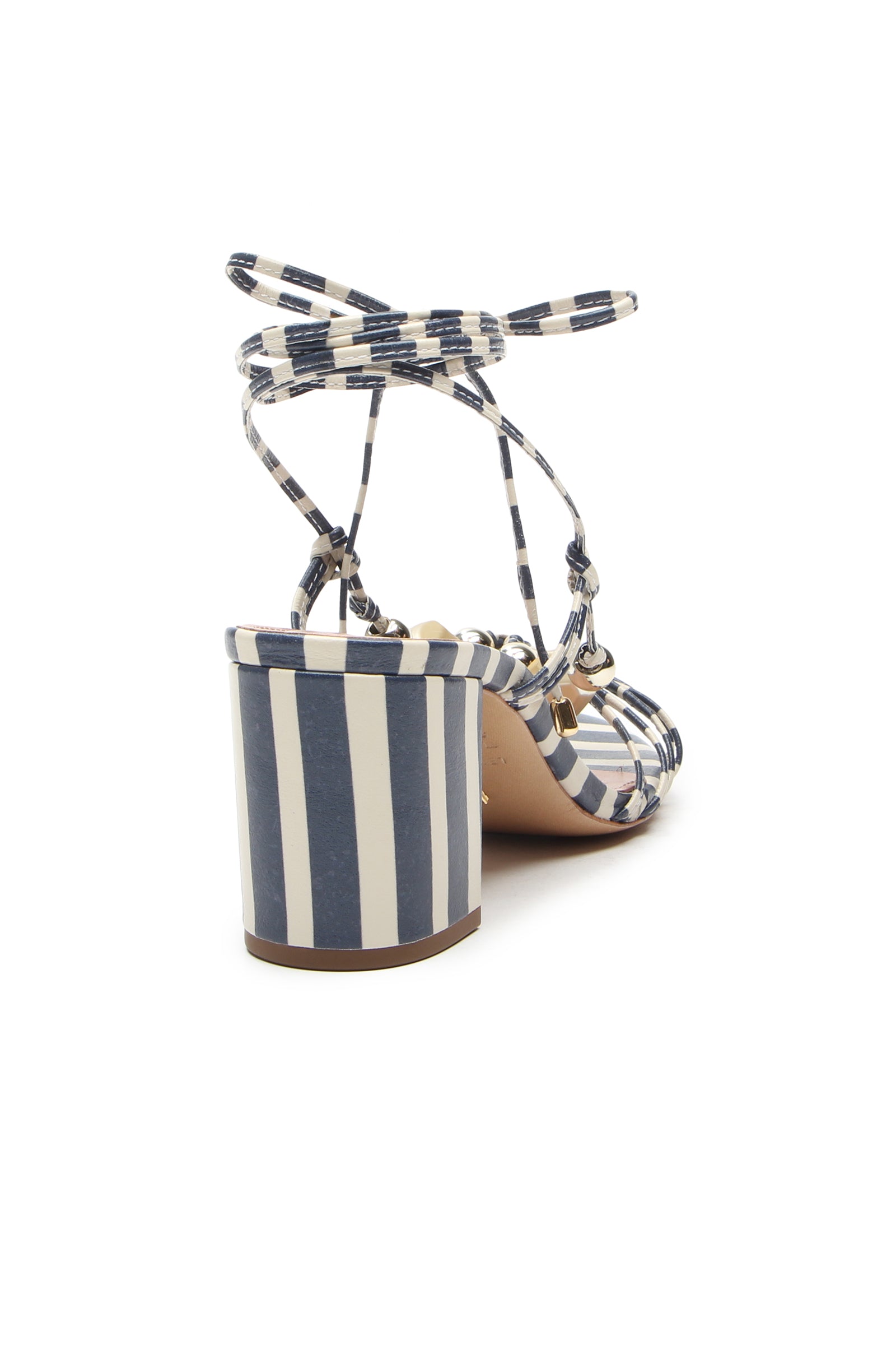 The Mantua Block Heel Sandal features blue and white vertical stripes, a sturdy block heel, and thin crisscross ankle straps, shown from the back.