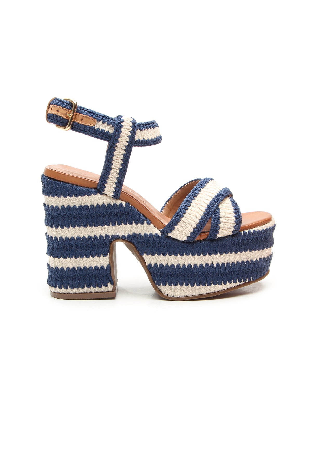The Zamzibar Platform is a navy sandal with a chunky heel, blue and white striped woven material, cross-toe straps, and an ankle strap with buckle.