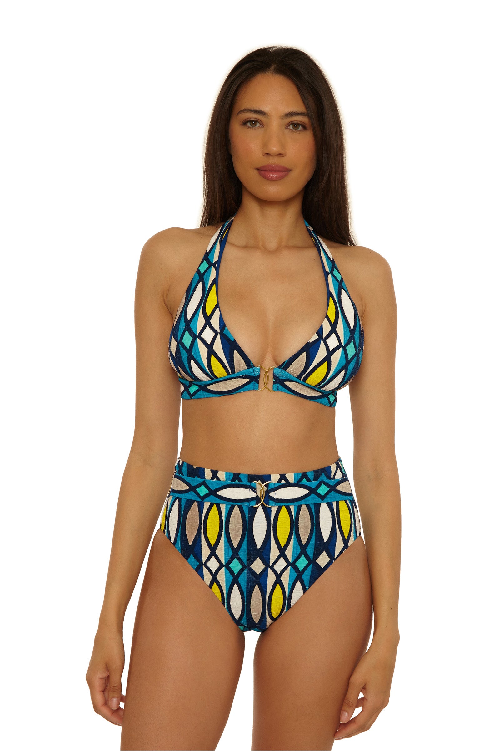 A woman with long brown hair wears a colorful geometric patterned bikini featuring a halter neck top and the Paros Belted Hi Waist Bottom in blue, yellow, and white.