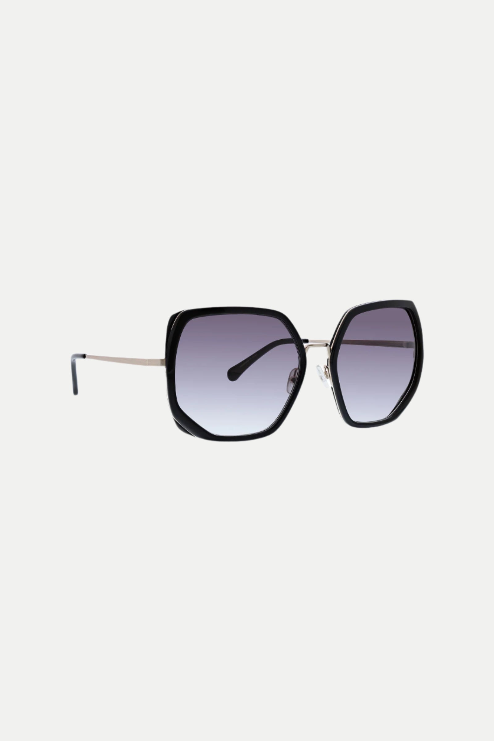 The Seraphine Oversized Square Sunglasses feature large geometric black frames, gradient dark lenses, thin silver arms with black tips, displayed against a plain white background.