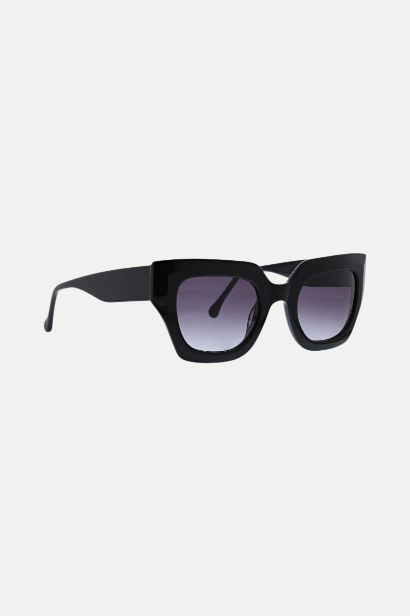 The Sol Wide Frame Square Acetate Sunglasses feature an oversized black square frame and dark gradient lenses, displayed at an angle against a white background.
