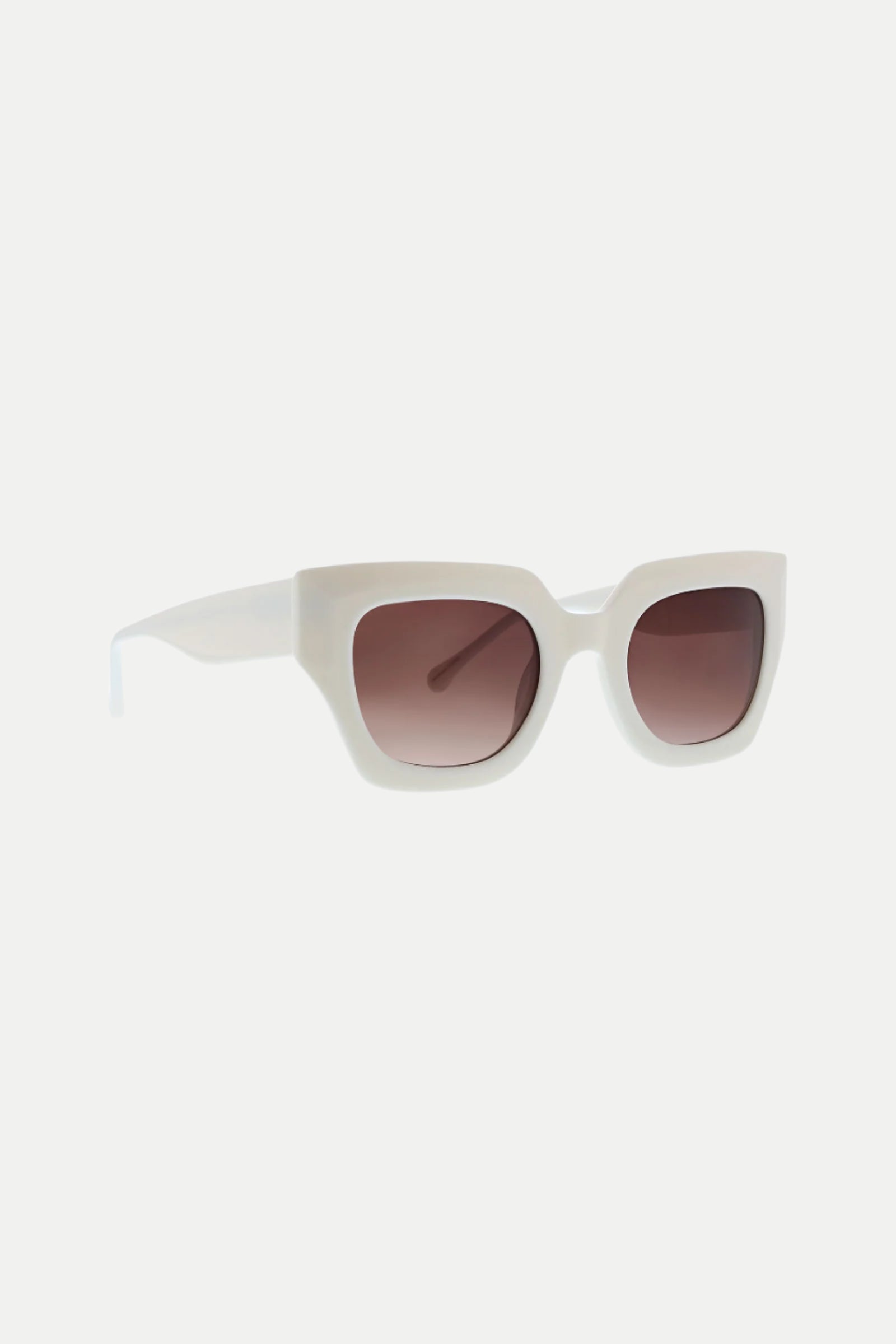 The Sol Wide Frame Square Acetate Sunglasses feature white, thick rims and brown-tinted lenses, displayed at an angle on a plain white background.