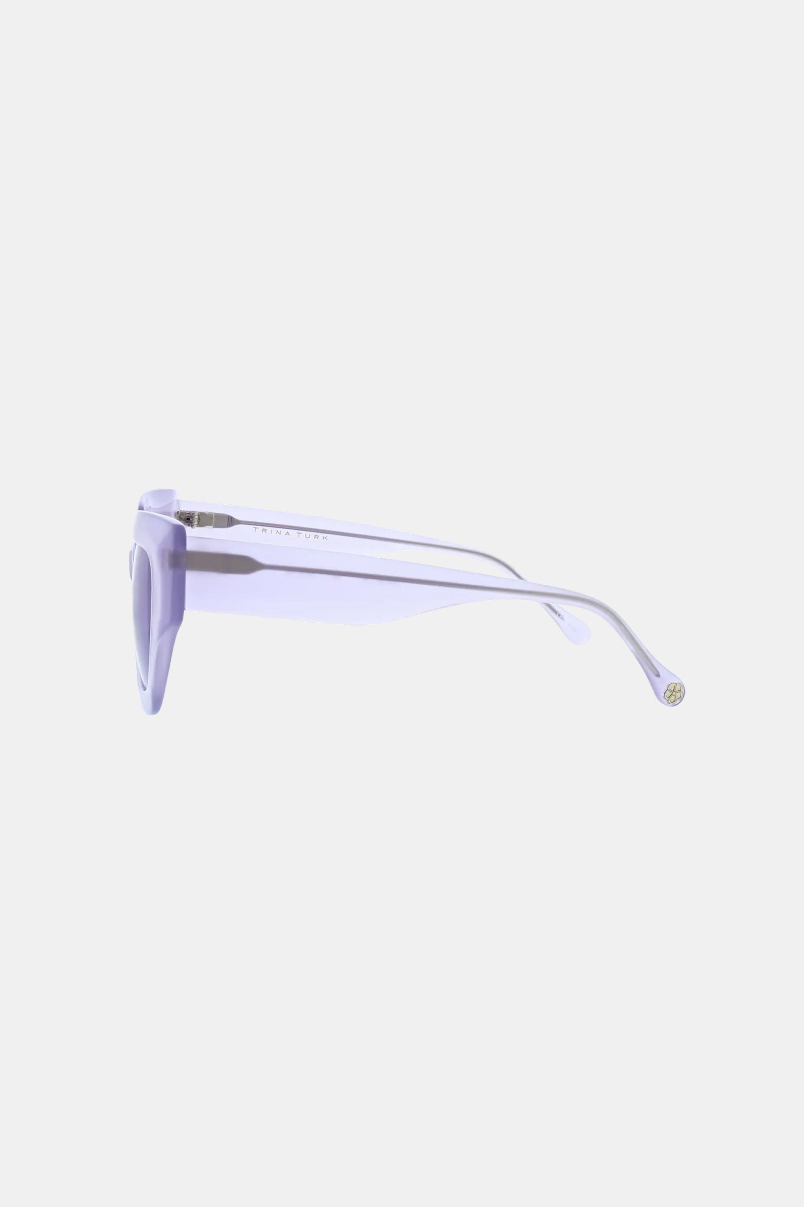 Side view of the Sol Sunglass, featuring translucent light purple thick frames and slightly curved arms, displayed against a plain white background.