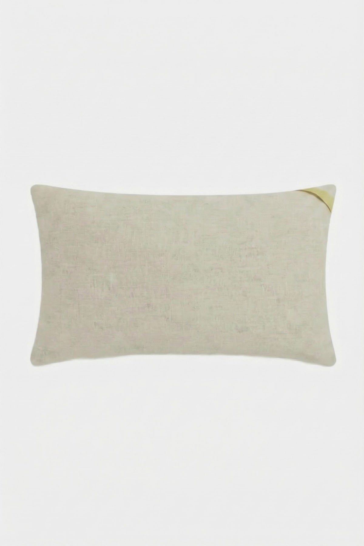 The Santorini White Tufted Throw Pillow 12"X24" is a rectangular pillow with a subtle texture and a small gold diagonal accent on one corner, displayed against a plain white background.