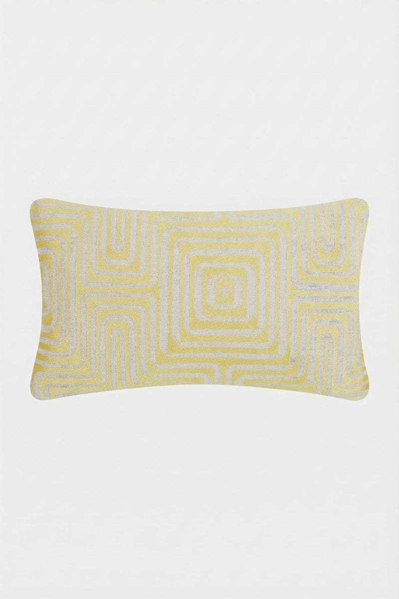 The Amazing Maze Embroidered Pillow is a rectangular pillow featuring a modern yellow and white geometric square pattern with overlapping squares and lines on a white background.
