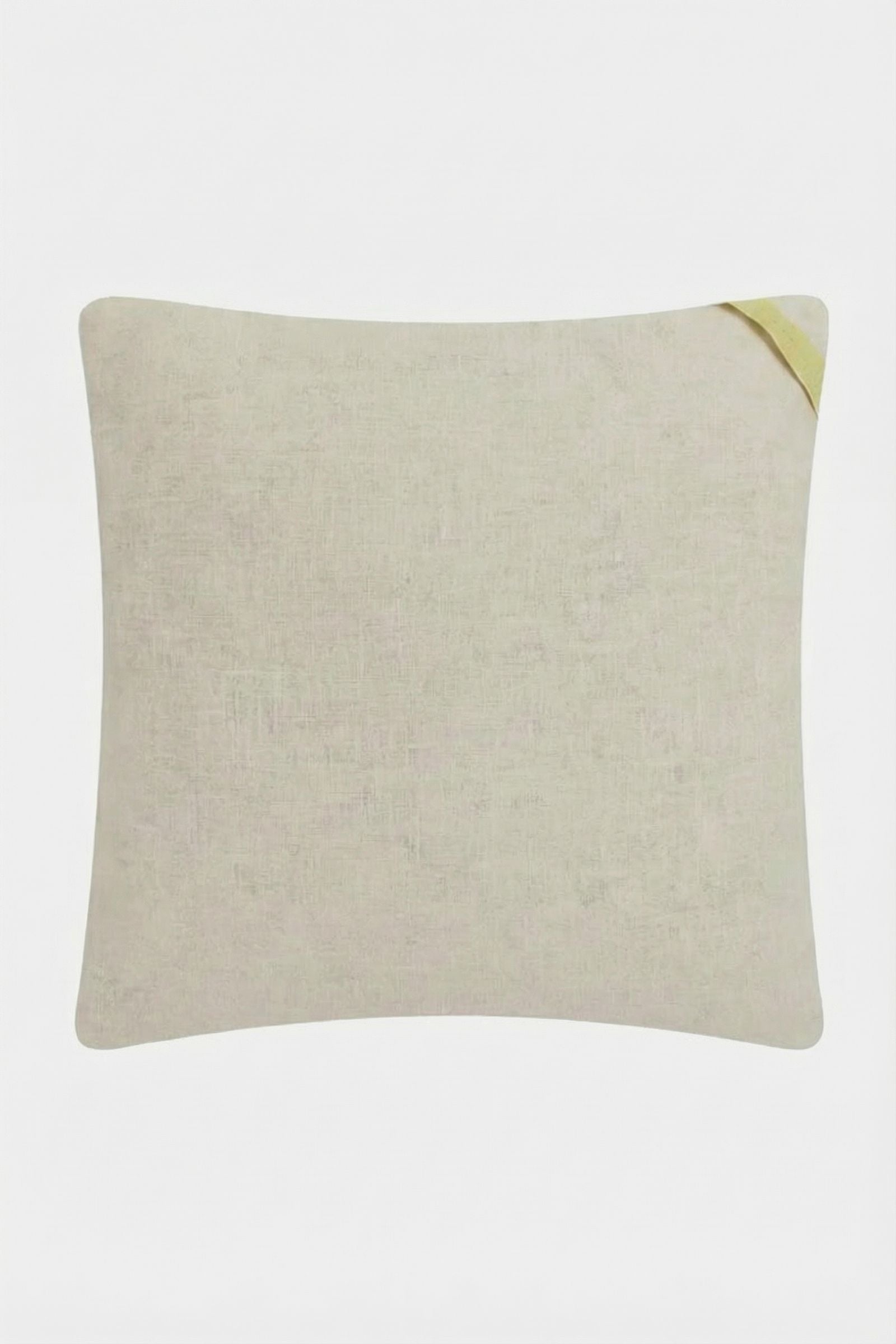 The Costa Mesa Embroidered Throw Pillow is square, light beige with a subtle texture, featuring a small yellow fabric loop on the top right corner, displayed against a plain white background.