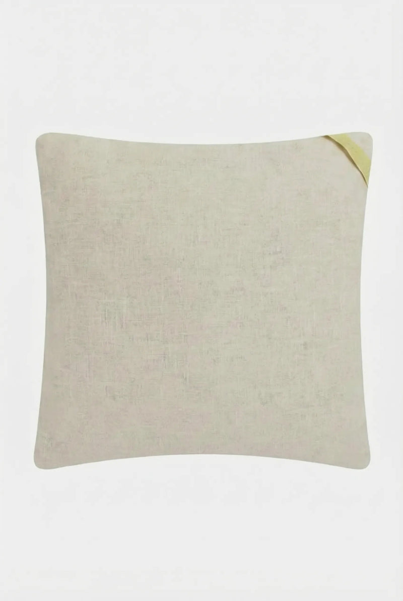 The Pasadena Embroidered Euro Throw Pillow is square, light beige, features a soft texture and a small, angled yellow fabric tab on the top right corner, shown against a plain white background.