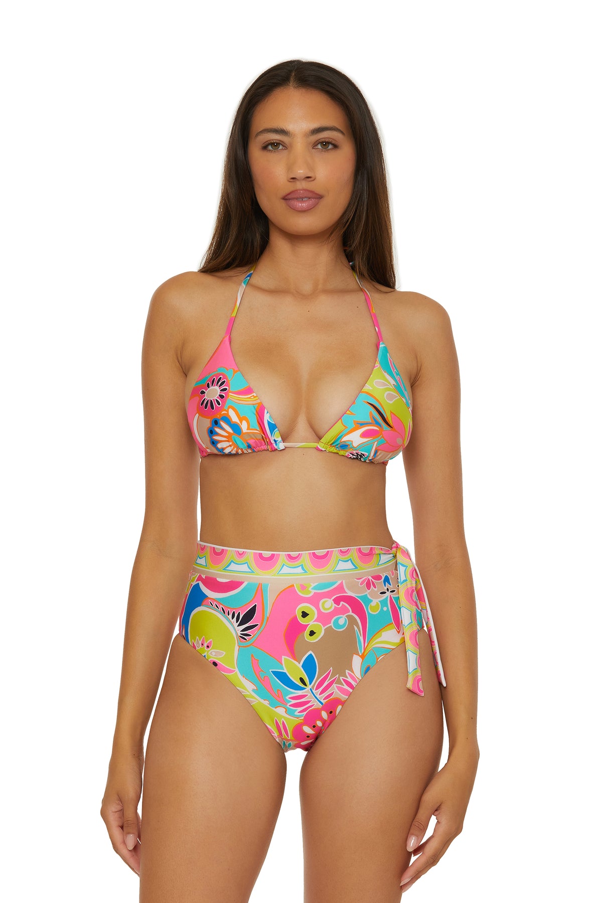 A woman models the Venus Banded High-Waist Swim Bottom with a halter bikini top in a colorful pattern, standing against a plain white background.