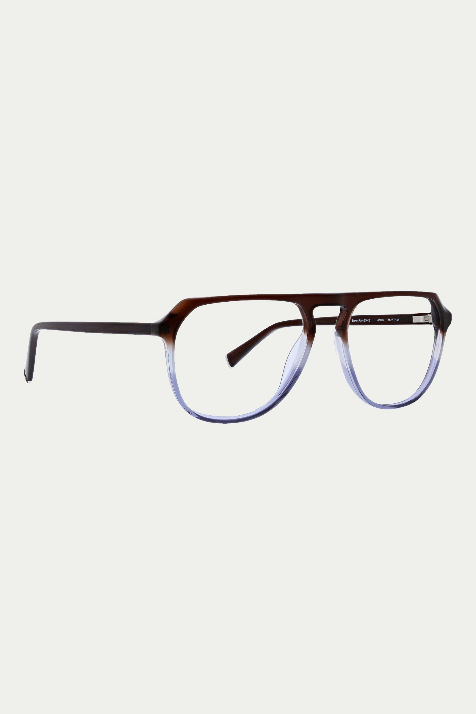 The Alvaro Optical Eyewear features rectangular acetate frames with a gradient design that shifts from dark brown at the top to a translucent light hue at the bottom, displayed against a plain white background.
