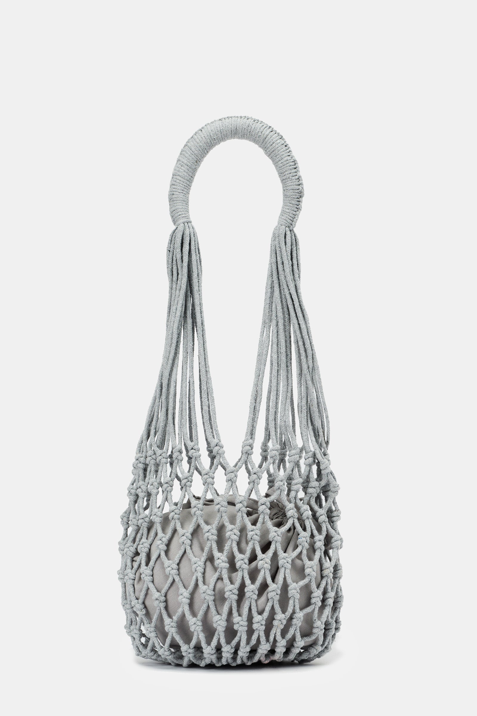 Of course! Please provide the keywords you'd like me to blend into the description of the NANNACAY KIM WOVEN BAG.