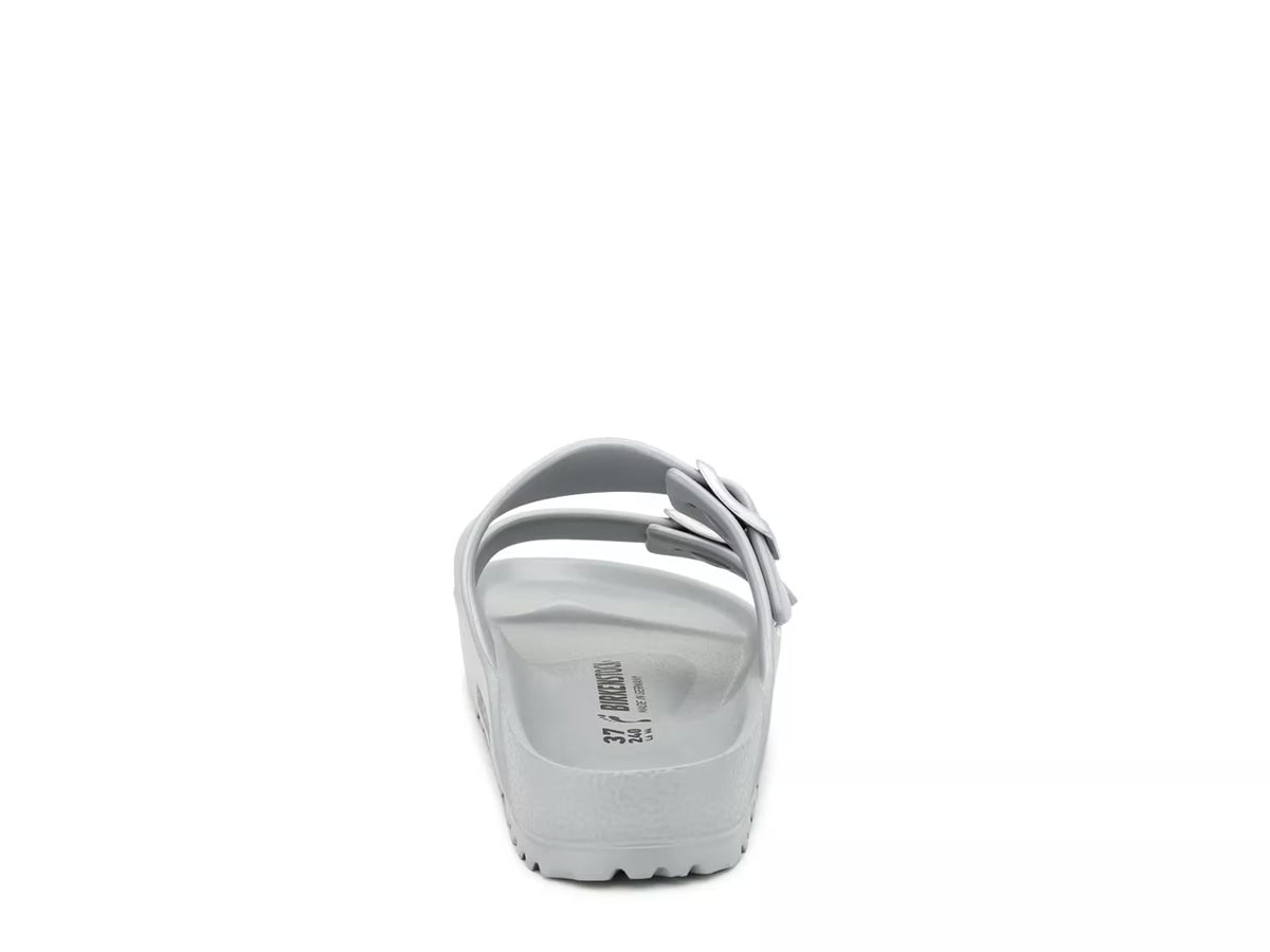 The Birkenstock Arizona Eva Sandal is shown from the back on a plain white background, featuring a single wide strap, a decorative bow on the right side, textured sole, and visible size markings inside.