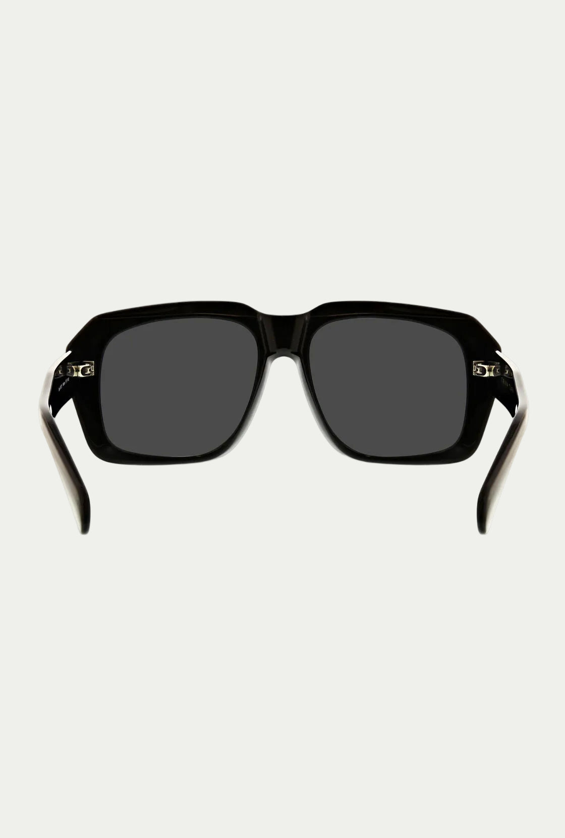 Front view of the Andros Sunglass featuring a bold black rectangular acetate frame, thick arms slightly open, and dark lenses offering 100% UVA/UVB protection, displayed on a white background.